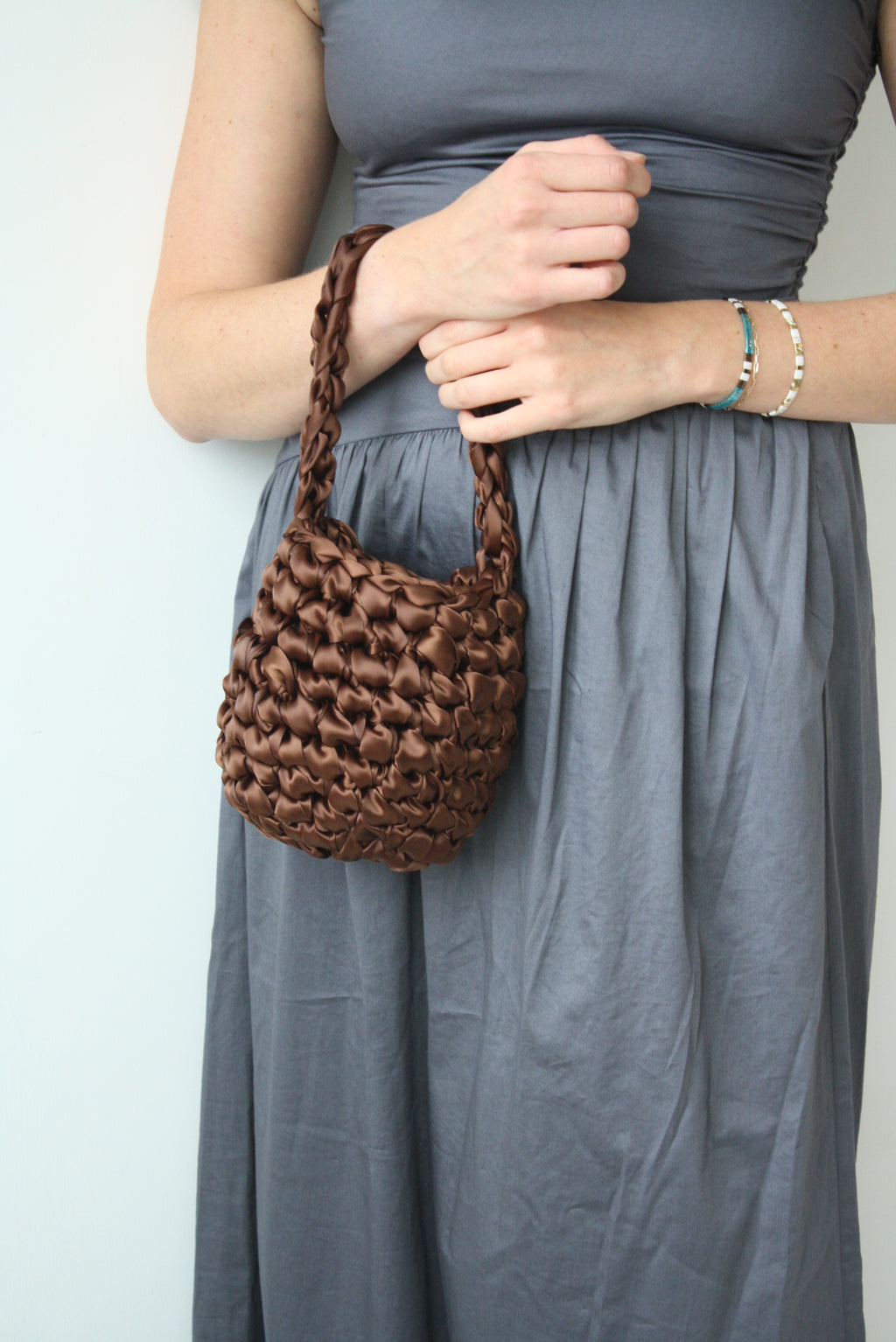 Mocha bridal bag lifestyle - luxury wedding clutch for modern brides and wedding guests