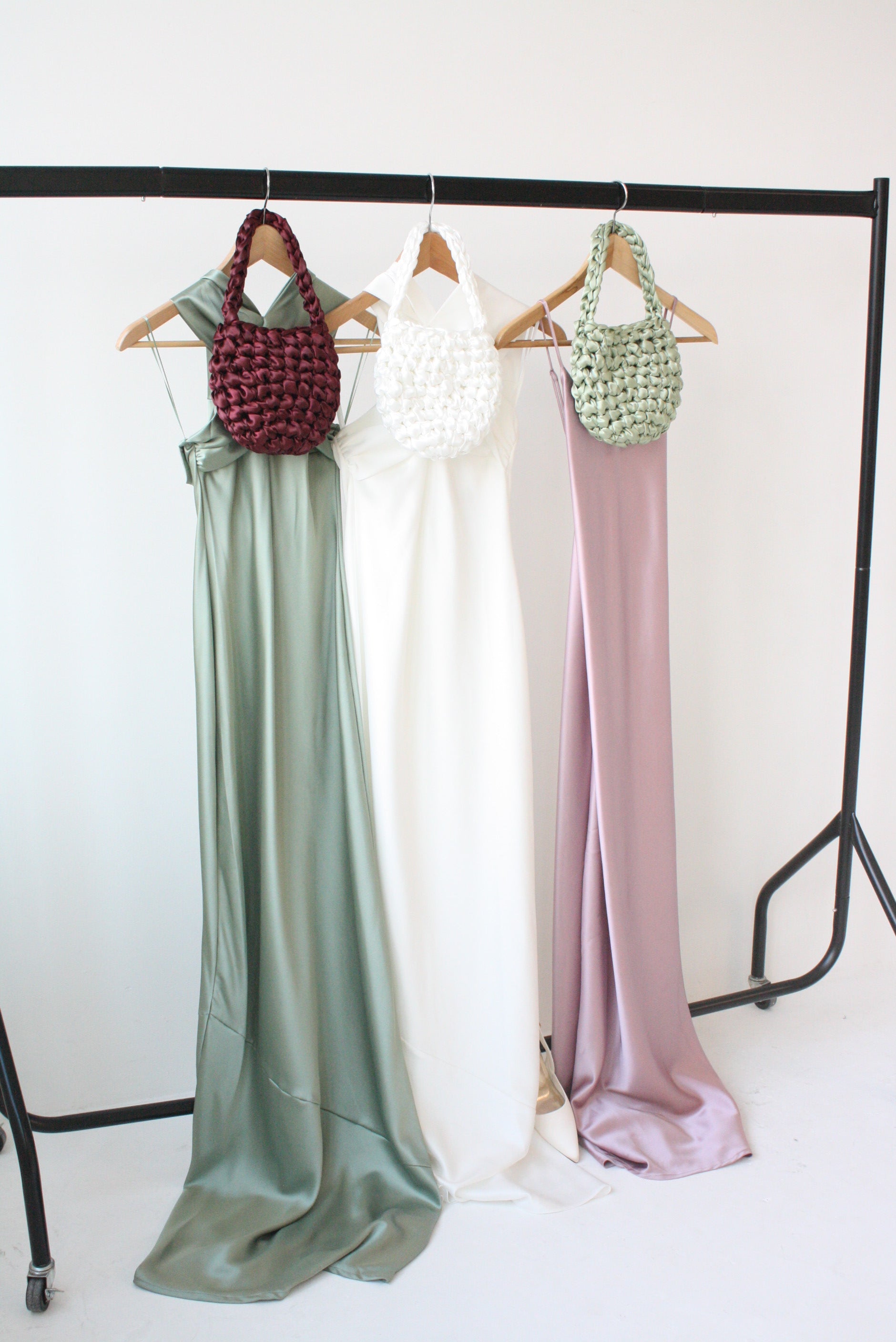 Sage green bridal bag lifestyle - luxury wedding clutch for modern brides and wedding guests