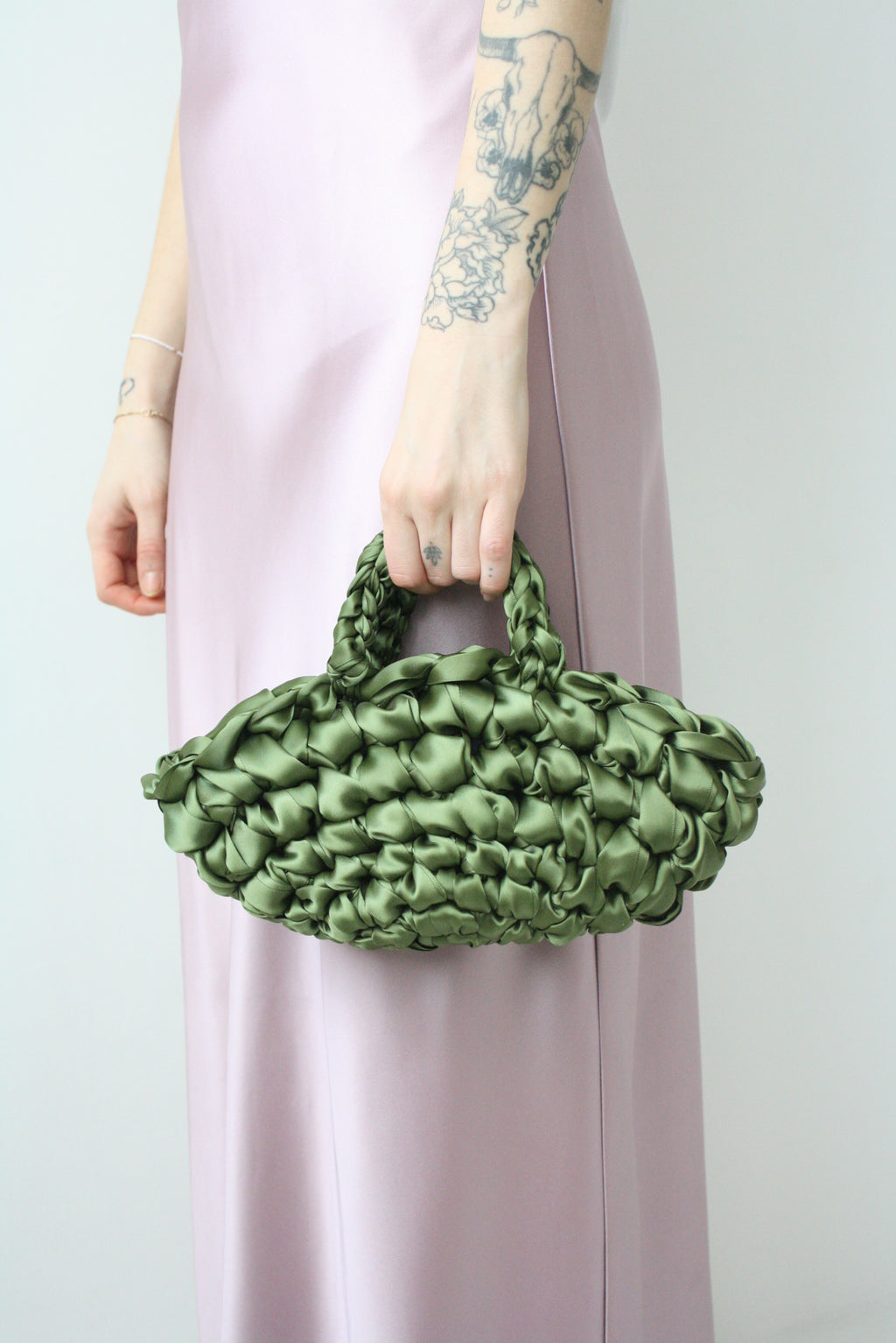 Green bridal bag handmade in London - luxury wedding clutch croissant bag for brides and bridesmaids