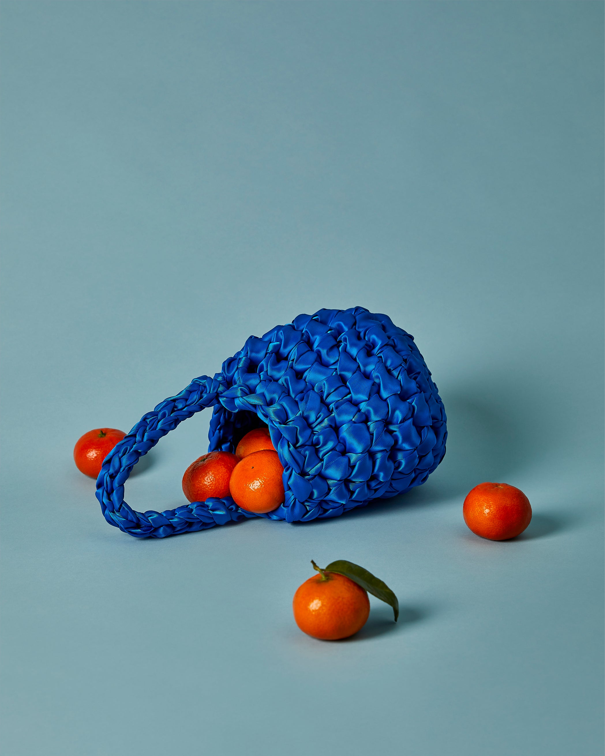 Blue bridal clutch handmade in London - luxury wedding bag perfect for modern brides and wedding guests